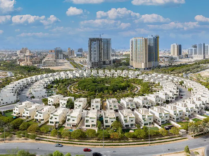 This is a picture of townhouses in Dubai with forest neighbourhoods.
